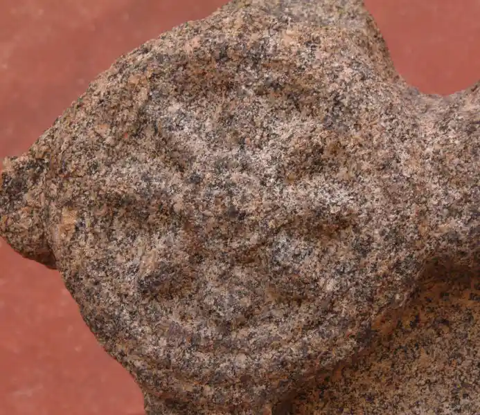 Statue of Vishnu, preserver god, eight-point solar disc